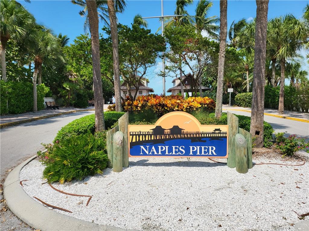 29 High Point Circle East, Unit 106 Naples, FL 34103 - Photo 41 of 42 a view of outdoor space with sign board