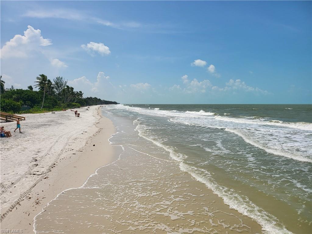 29 High Point Circle East, Unit 106 Naples, FL 34103 - Photo 42 of 42 a view of a ocean beach