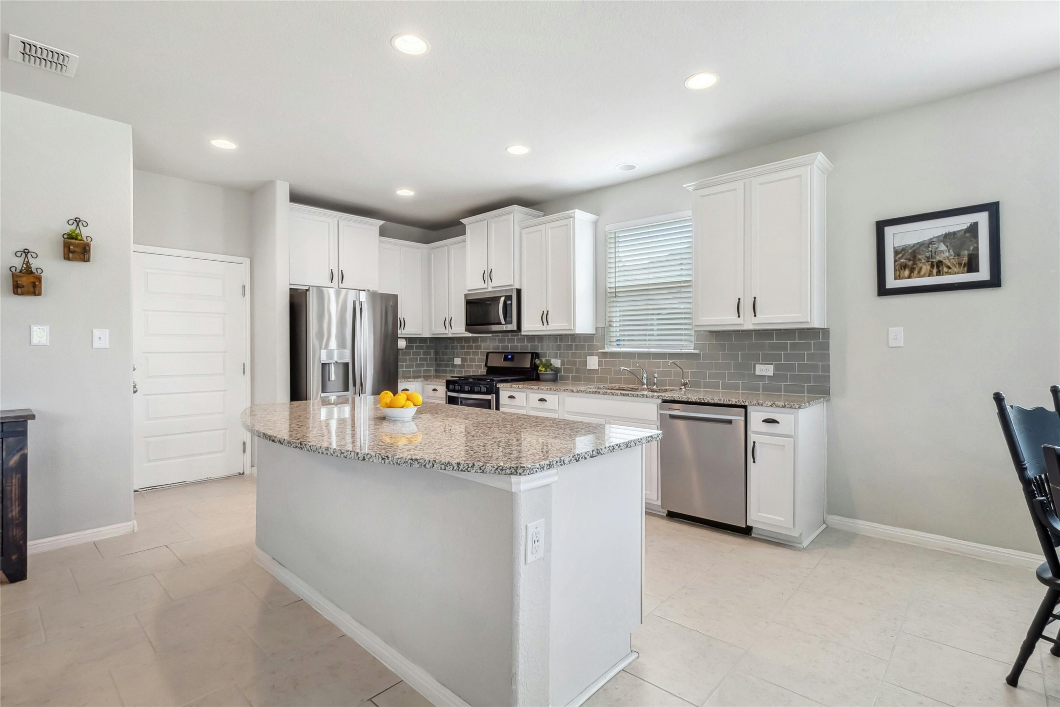 112 Silver Spgs Bend Kyle, TX 78640 - Photo 13 of 33 Extra large island for serving & entertaining.