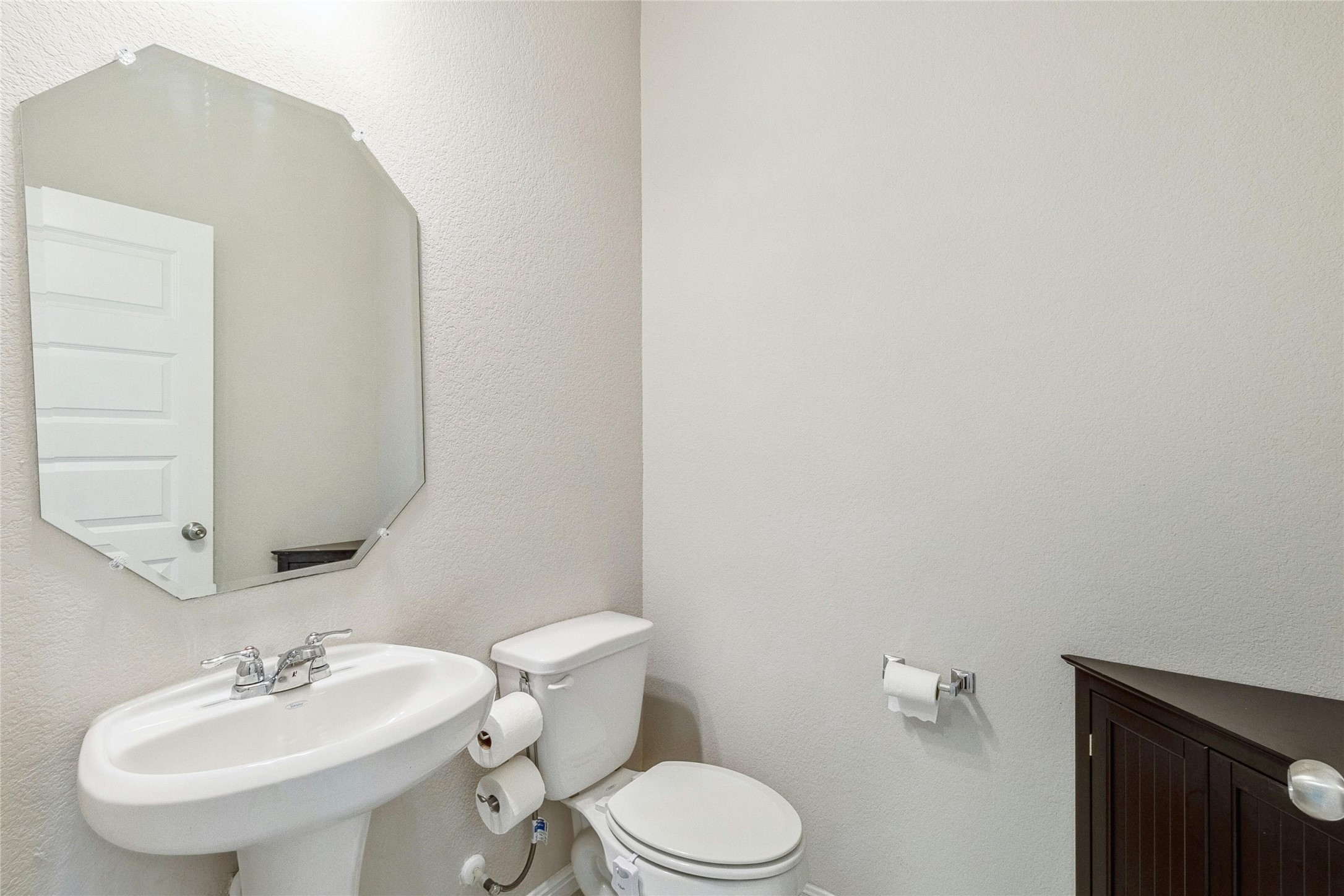 112 Silver Spgs Bend Kyle, TX 78640 - Photo 15 of 33 Half bath conveniently located downstairs.
