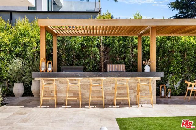 a view of a house with patio