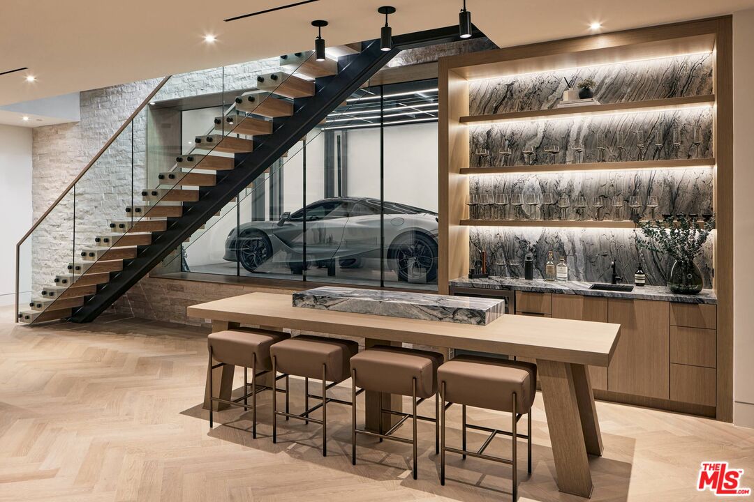 740 Warner Avenue Los Angeles, CA 90024 - Photo 42 of 53 a dinning table and chairs in a room