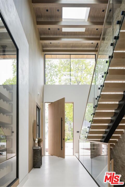 740 Warner Avenue Los Angeles, CA 90024 - Photo 5 of 53 a view of entryway and hall with wooden floor