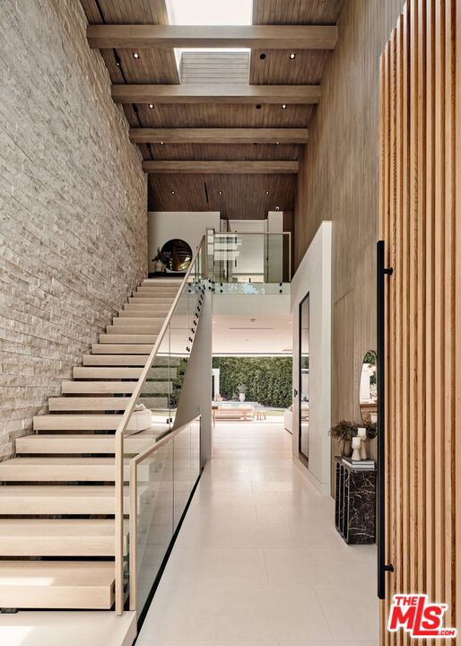 740 Warner Avenue Los Angeles, CA 90024 - Photo 6 of 53 a view of entryway and hall with wooden floor