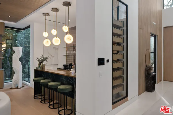 a bathroom with sink and mirror