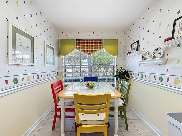 a kitchen with stainless steel appliances granite countertop a refrigerator sink and microwave