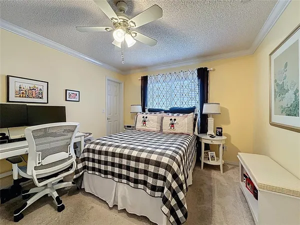 a bedroom with a bed and a walk in closet