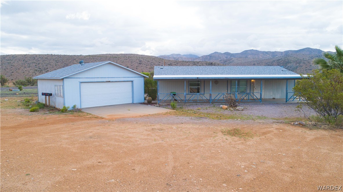 7374 Windmill Road Kingman, AZ 86401 - Photo 1 of 49 a house with a outdoor space