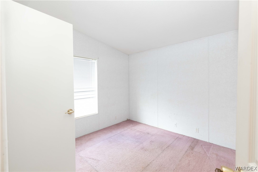 7374 Windmill Road Kingman, AZ 86401 - Photo 27 of 49 a view of empty room with window
