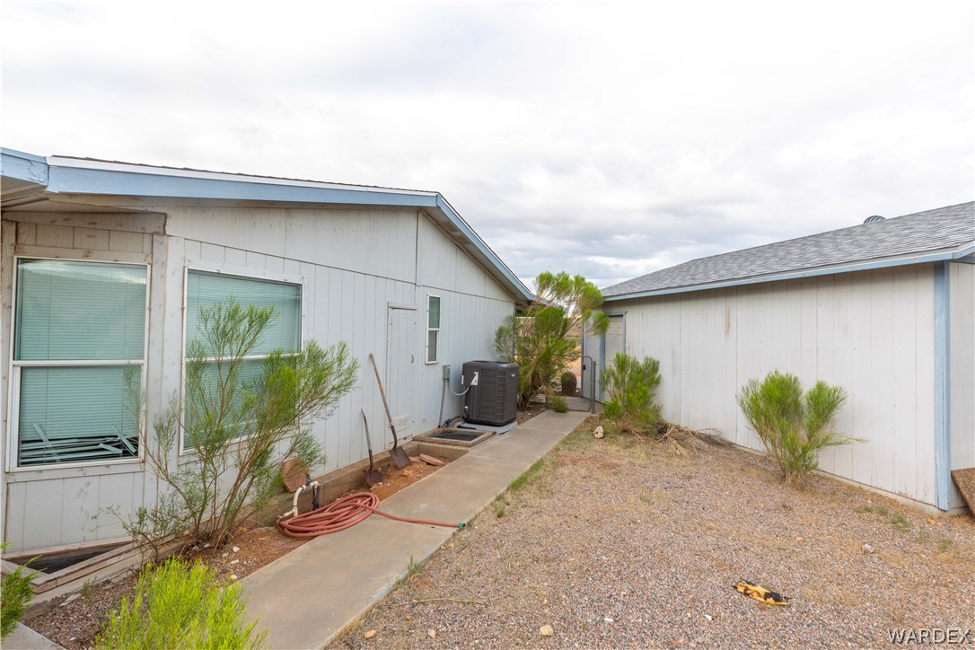 7374 Windmill Road Kingman, AZ 86401 - Photo 38 of 49 a view of a house with a backyard