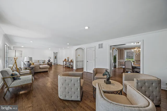 a kitchen with stainless steel appliances granite countertop a sink a stove and a microwave