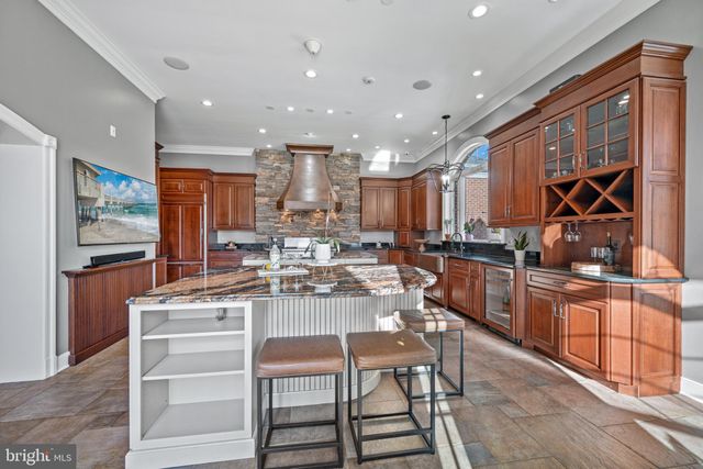 a spacious bedroom with a bed and a dresser