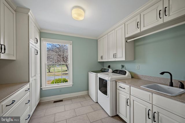 a view of a house with a big yard