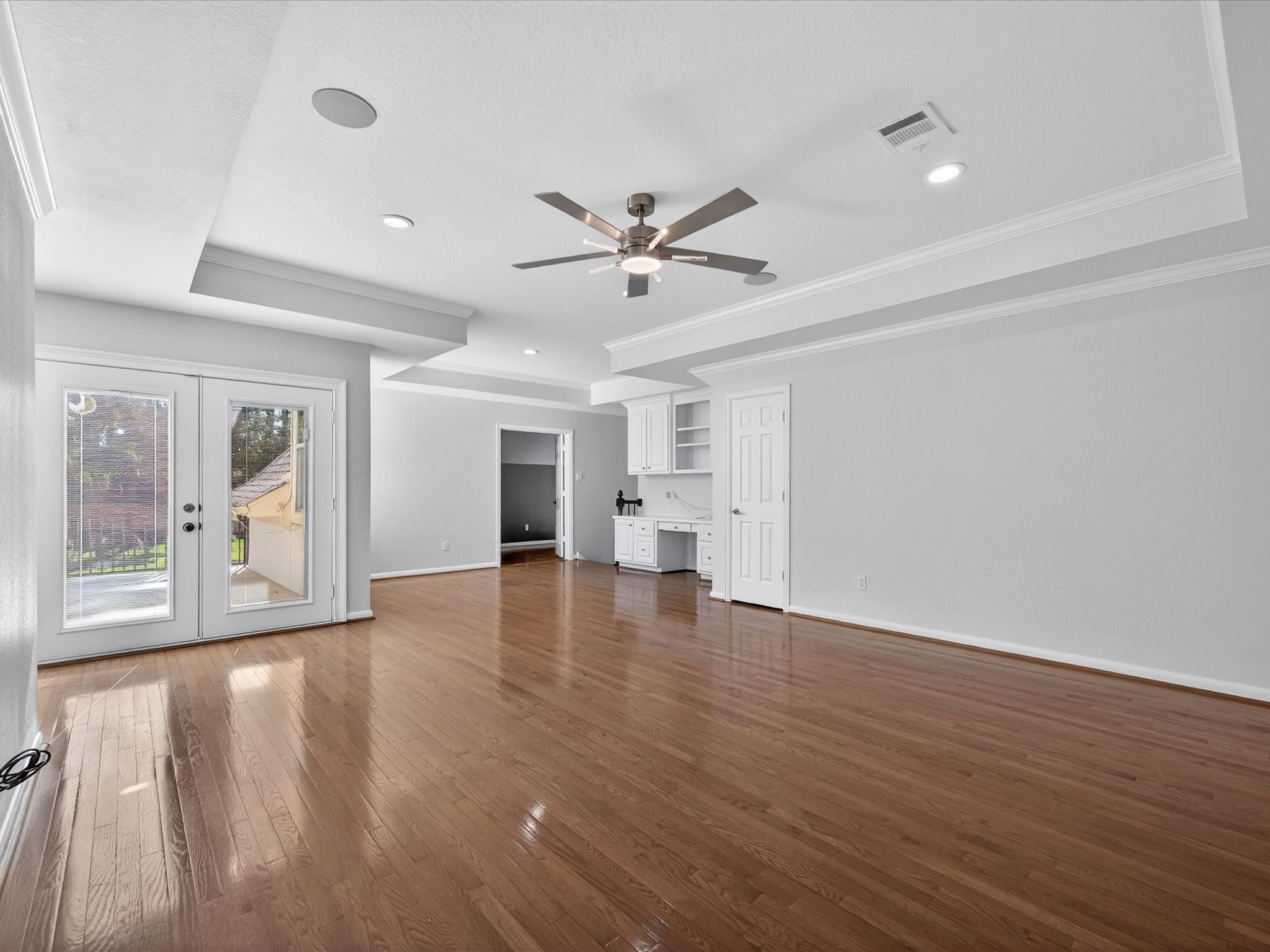 11 Gleannloch Estates Drive Spring, TX 77379 - Photo 28 of 50 The expansive upstairs game room includes built-ins, a study nook, and access to a large outdoor balcony.