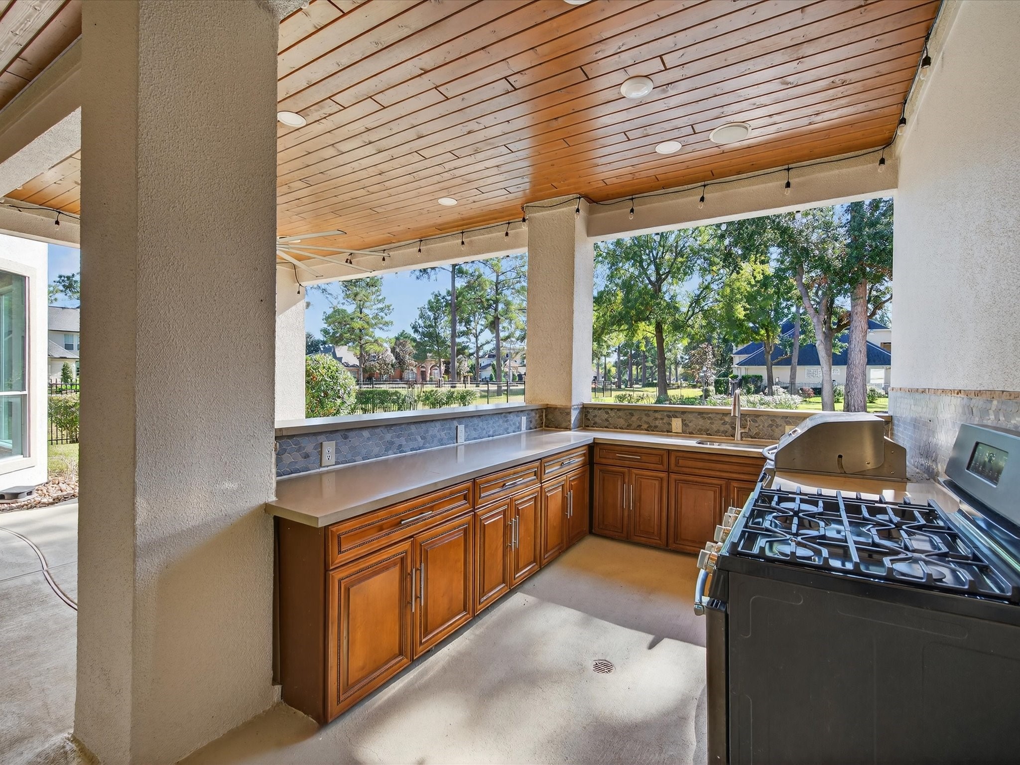 11 Gleannloch Estates Drive Spring, TX 77379 - Photo 37 of 50 This kitchen inspires you to cook, gather, and celebrate life with family and friends in a stunning outdoor setting.