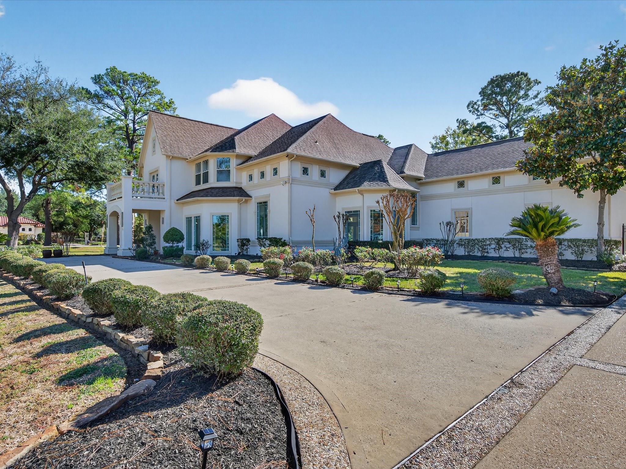 11 Gleannloch Estates Drive Spring, TX 77379 - Photo 4 of 50 The impressive facade is complemented by lush, manicured landscaping, creating instant curb appeal and a sense of tranquility.