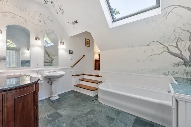 a bathroom with a sink and a bathtub
