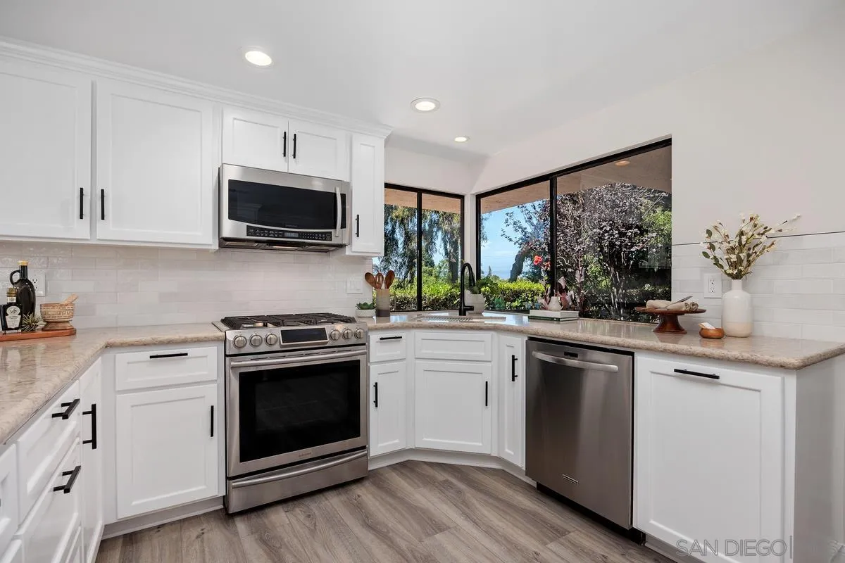 1355 Sun Valley Road Solana Beach, CA 92075 - Photo 13 of 37 NIce outlook to patio from the kitchen
