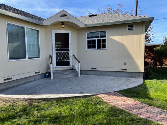 36733 Olive Street Newark, CA 94560 - Photo 2 of 16 a front view of a house with a yard