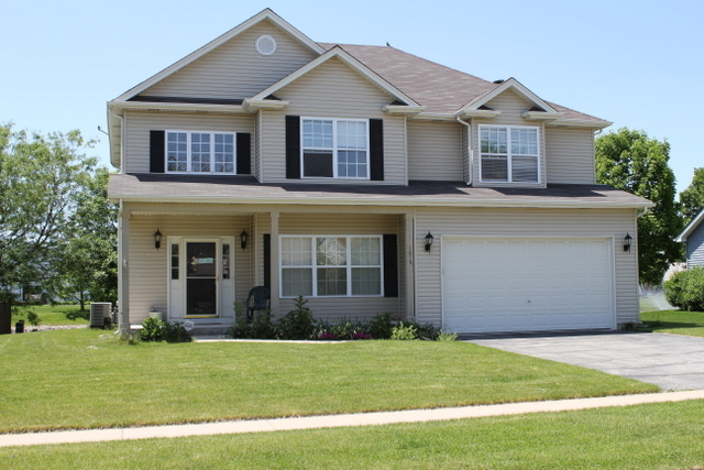 1815 Hampton Court Plainfield, IL 60586 - Photo 1 of 1 a front view of a house with a yard