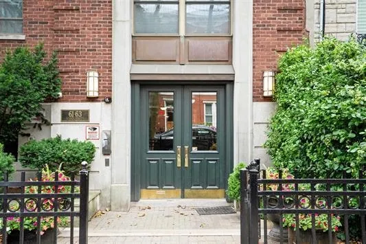 a view of a building and a street