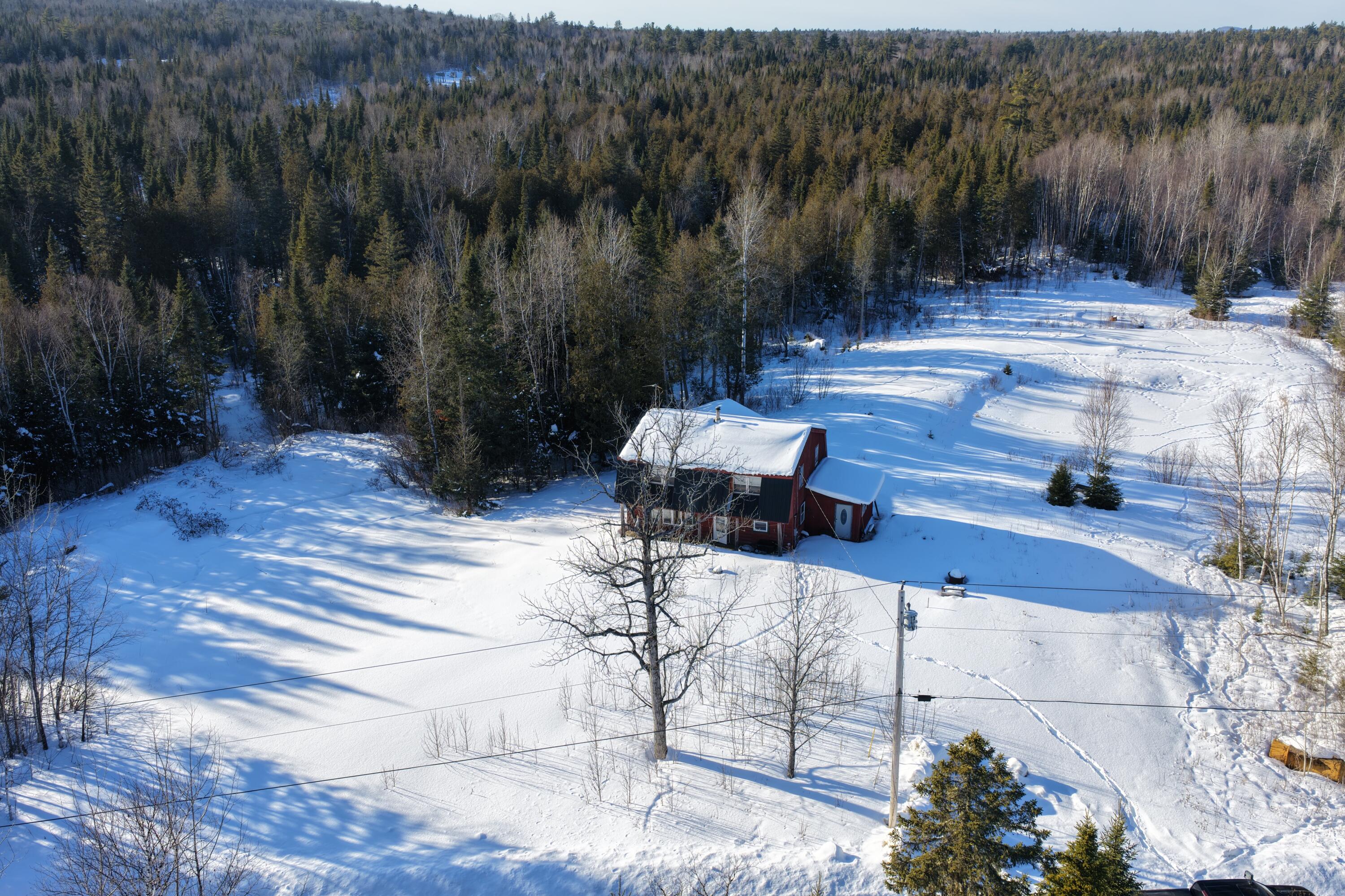 1130 Wrightville Road Ashland, ME 04732 - Photo 2 of 13 DJI_20260217040626_0176_D
