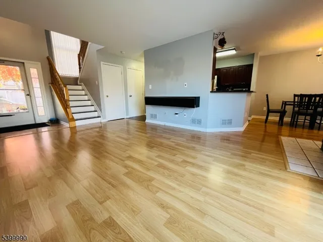 a view of kitchen with furniture and flat screen tv