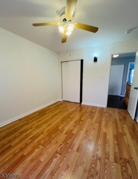 15 Weatherhill Road Hamburg, NJ 07419 - Photo 2 of 13 a bedroom with a bed and a chandelier