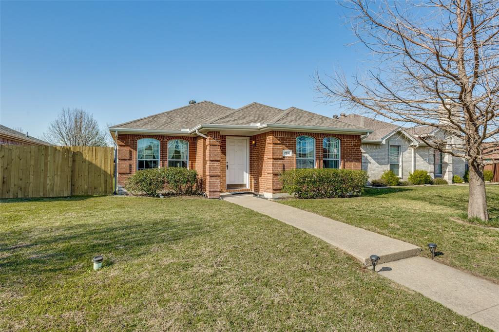704 Kerwin Court Wylie, TX 75098 - Photo 1 of 1 View of front facade featuring roof with shingles, a front yard, fence, and brick siding