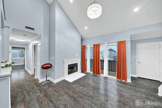 a view of livingroom with furniture wooden floor and window