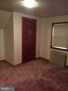1829 Middleborough Road Baltimore, MD 21221 - Photo 16 of 20 an empty room with windows & door