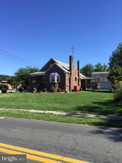 1829 Middleborough Road Baltimore, MD 21221 - Photo 3 of 20 a front view of a house with a yard
