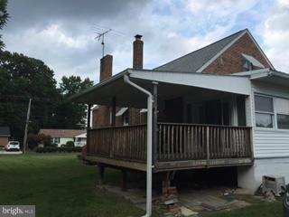 1829 Middleborough Road Baltimore, MD 21221 - Photo 5 of 20 a front view of a house with garden