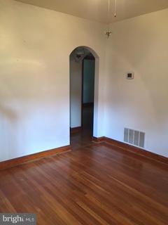1829 Middleborough Road Baltimore, MD 21221 - Photo 9 of 20 a view of empty room with wooden floor