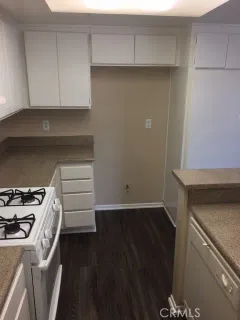 a view of storage and utility room with washer and dryer