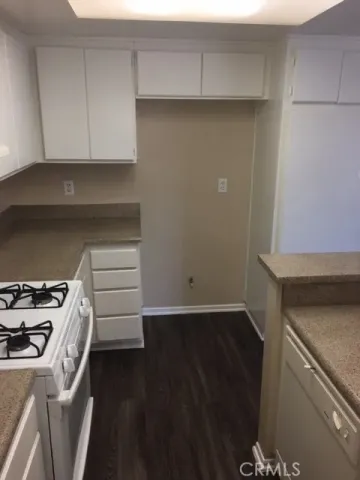 a view of storage and utility room with washer and dryer