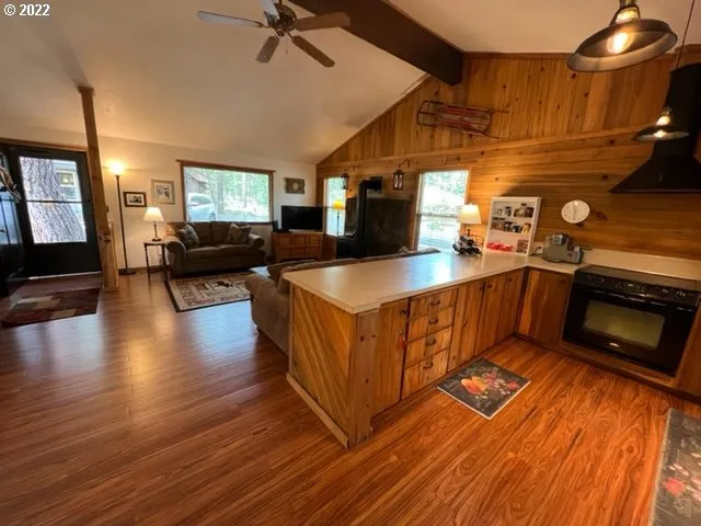 a kitchen with stainless steel appliances a sink and a refrigerator