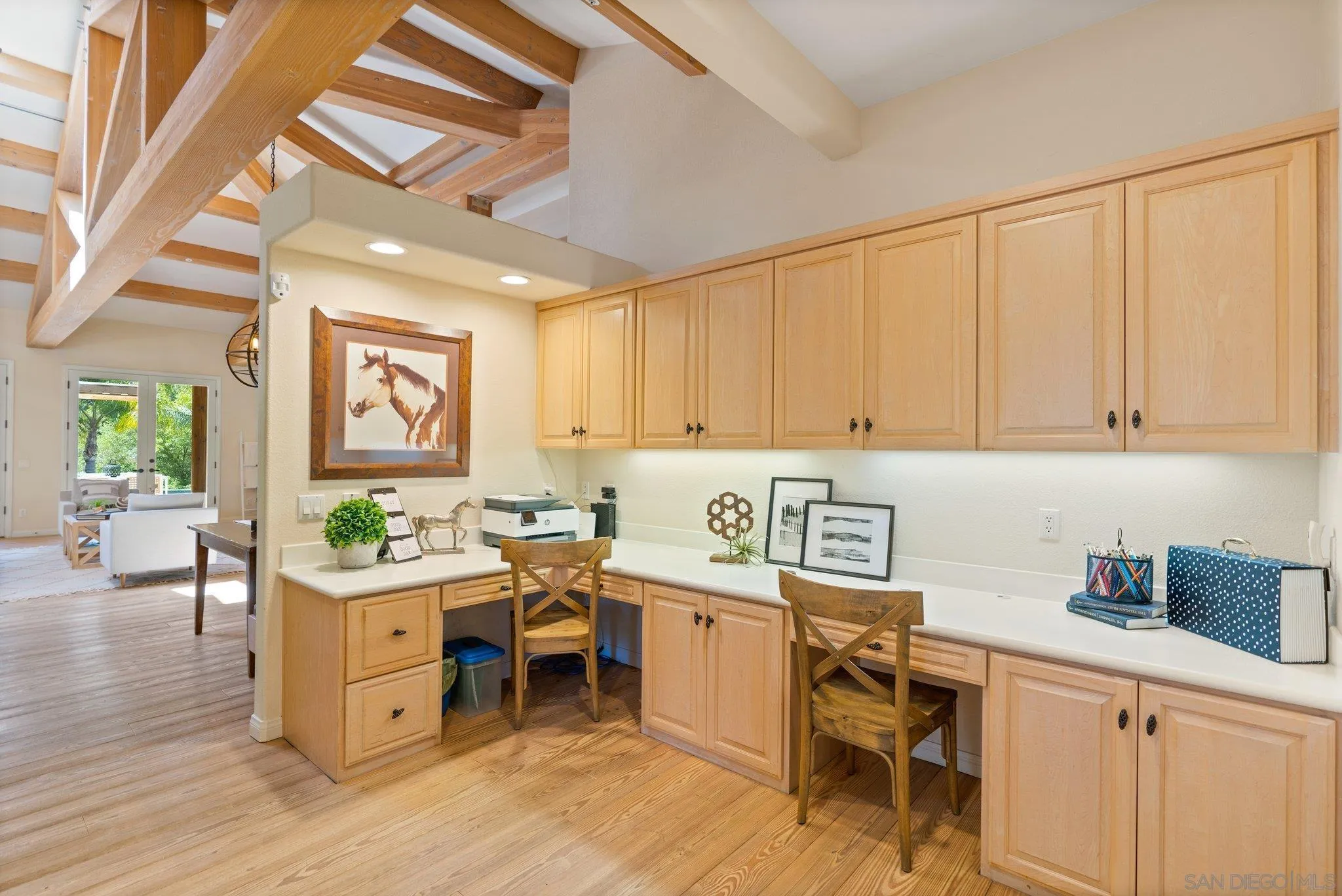 3111 Brookside Lane Encinitas, CA 92024 - Photo 11 of 40 a room with stainless steel appliances kitchen island granite countertop a sink and cabinets