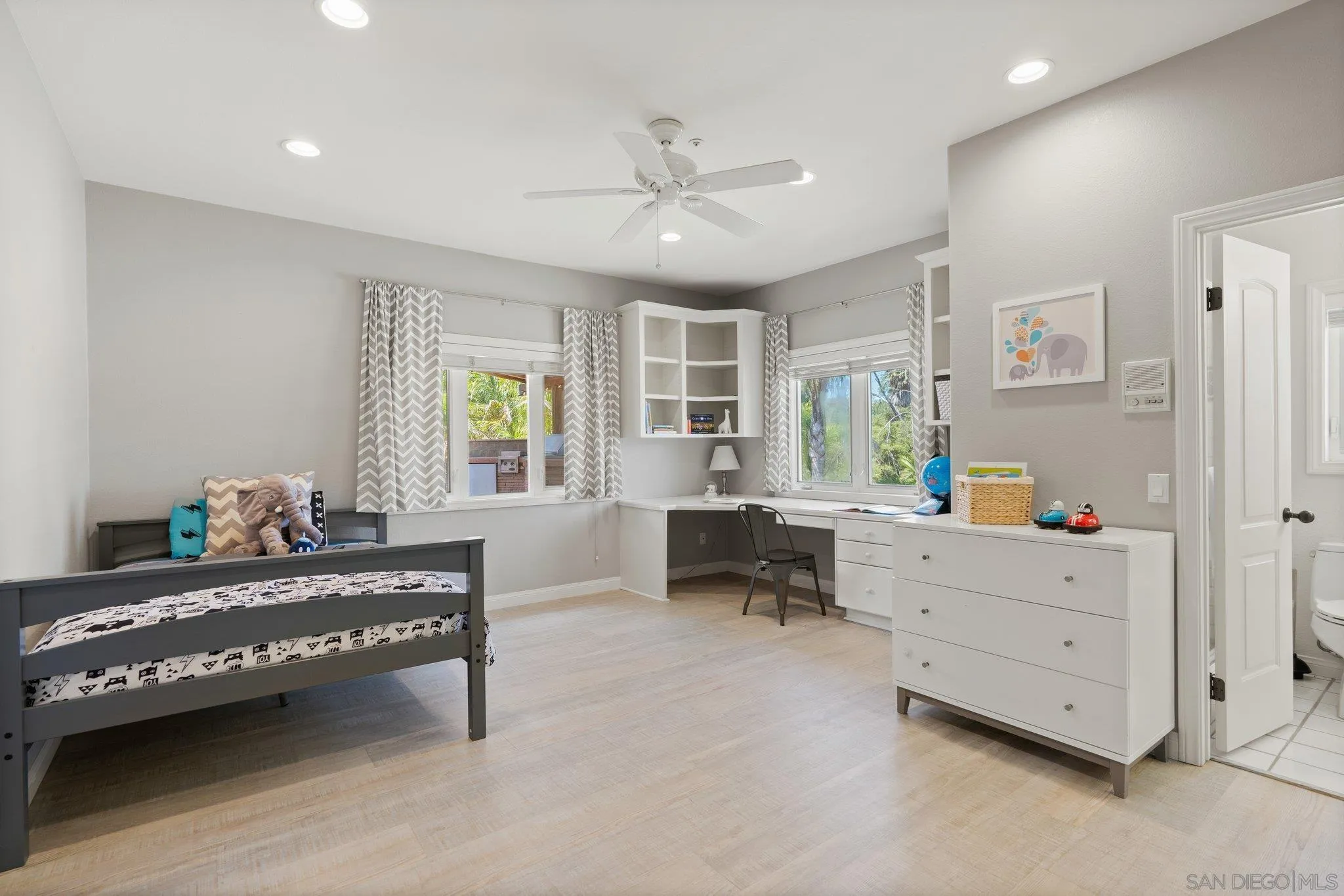3111 Brookside Lane Encinitas, CA 92024 - Photo 17 of 40 a bedroom with furniture and a window