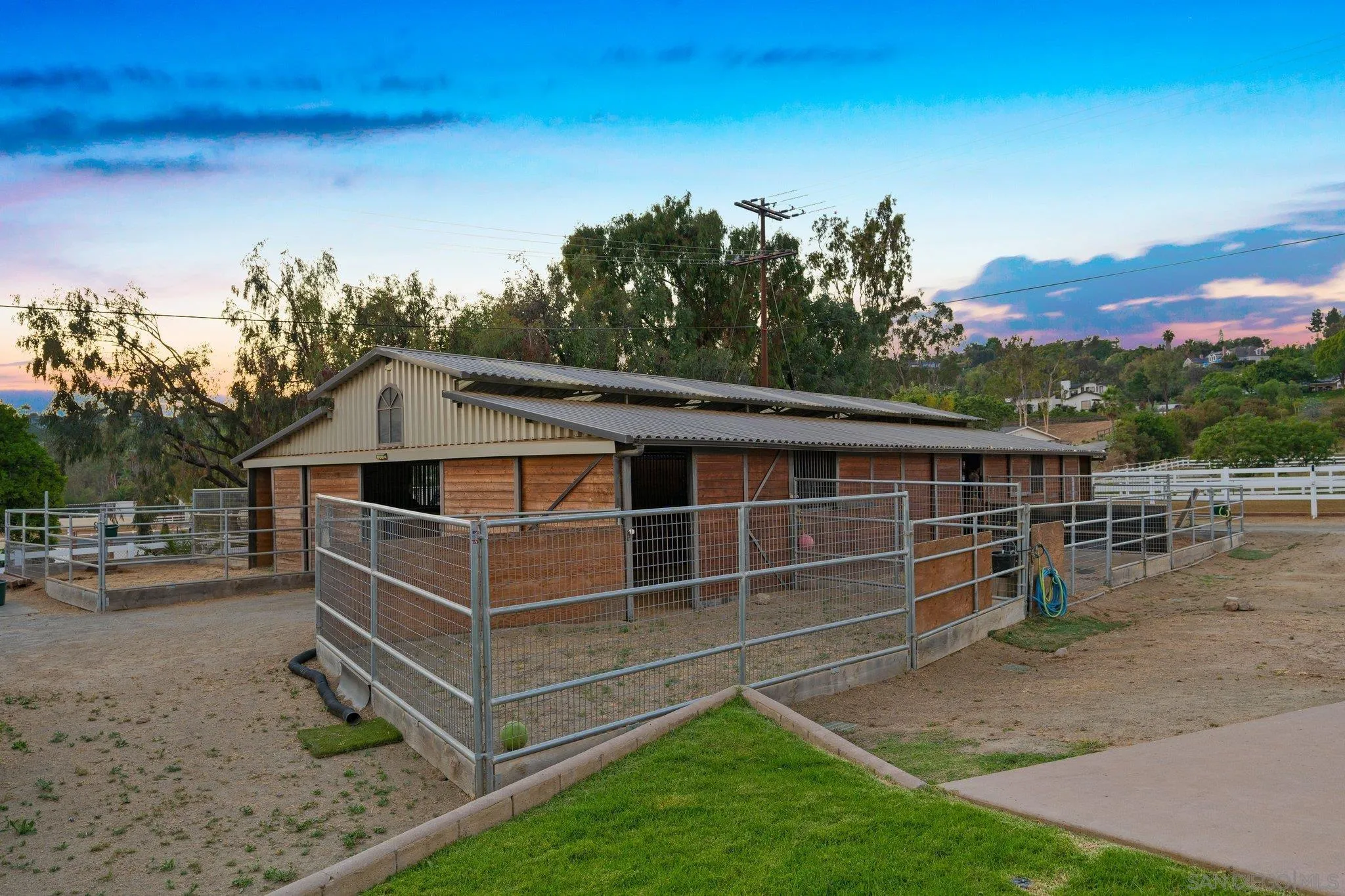 3111 Brookside Lane Encinitas, CA 92024 - Photo 29 of 40 a view of a roof deck with wooden fence and floor