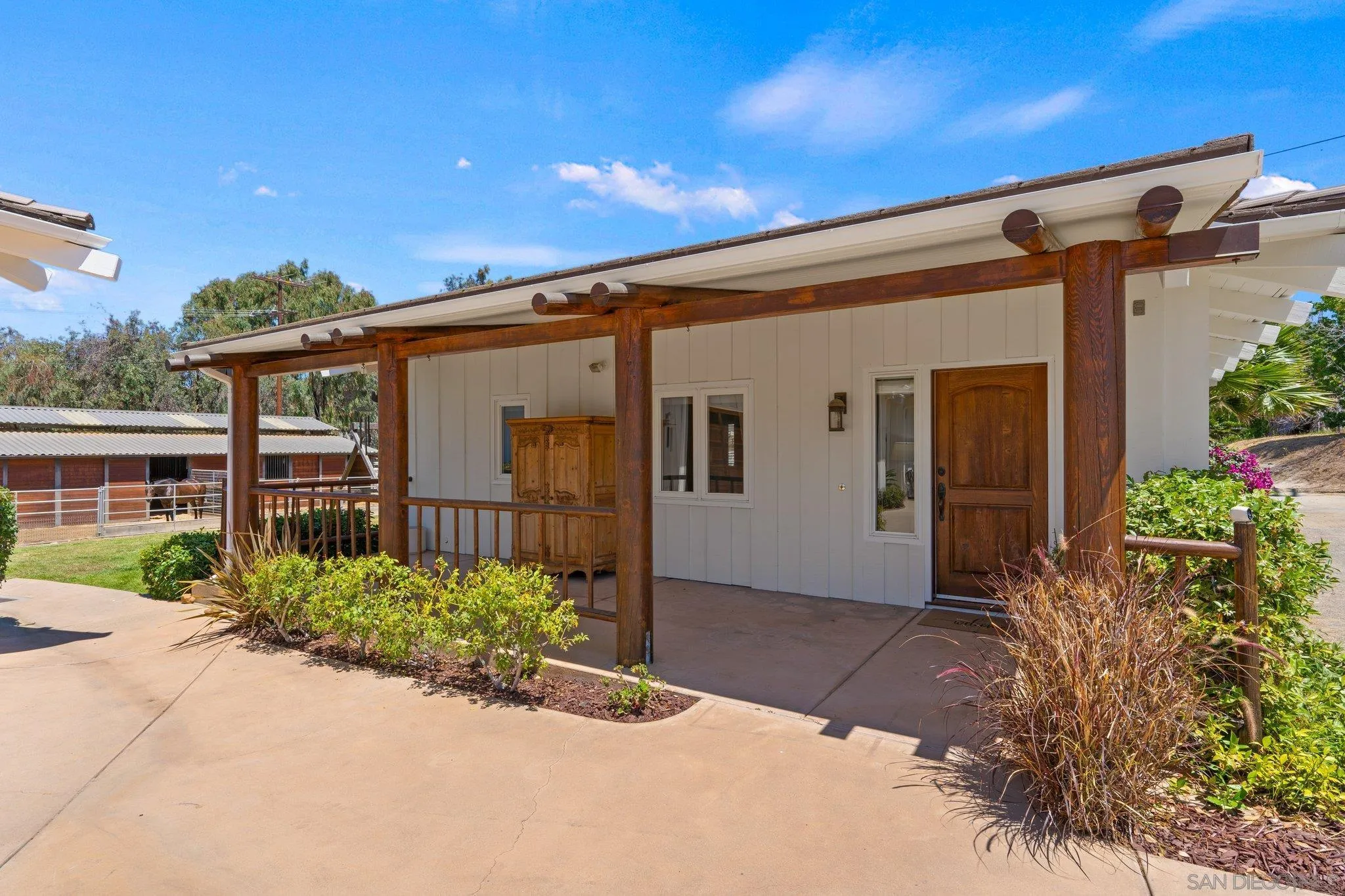 3111 Brookside Lane Encinitas, CA 92024 - Photo 30 of 40 front view of a house with potted plants