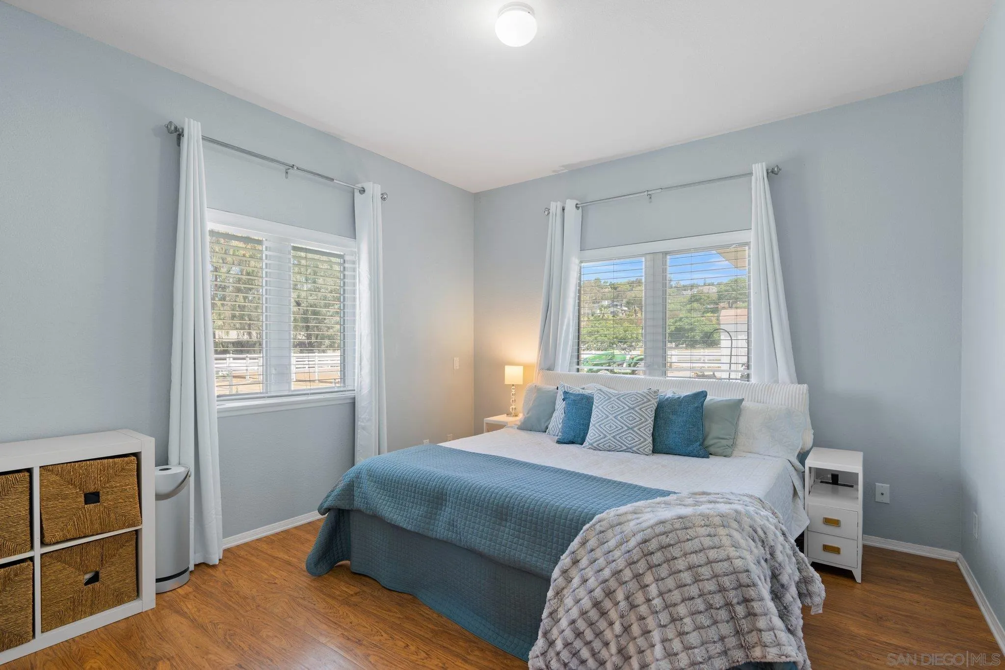 3111 Brookside Lane Encinitas, CA 92024 - Photo 32 of 40 a bedroom with a bed and a window