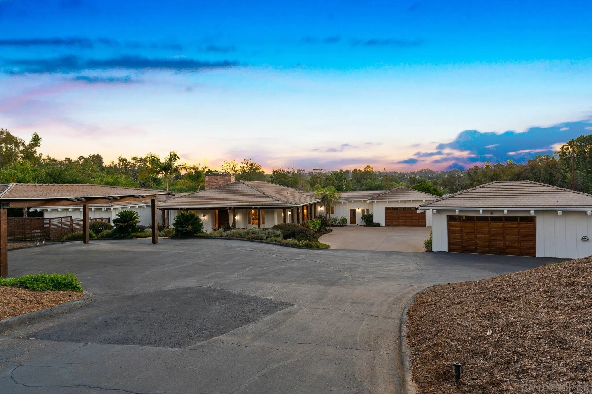 3111 Brookside Lane Encinitas, CA 92024 - Photo 39 of 40 a front view of a house with a garden