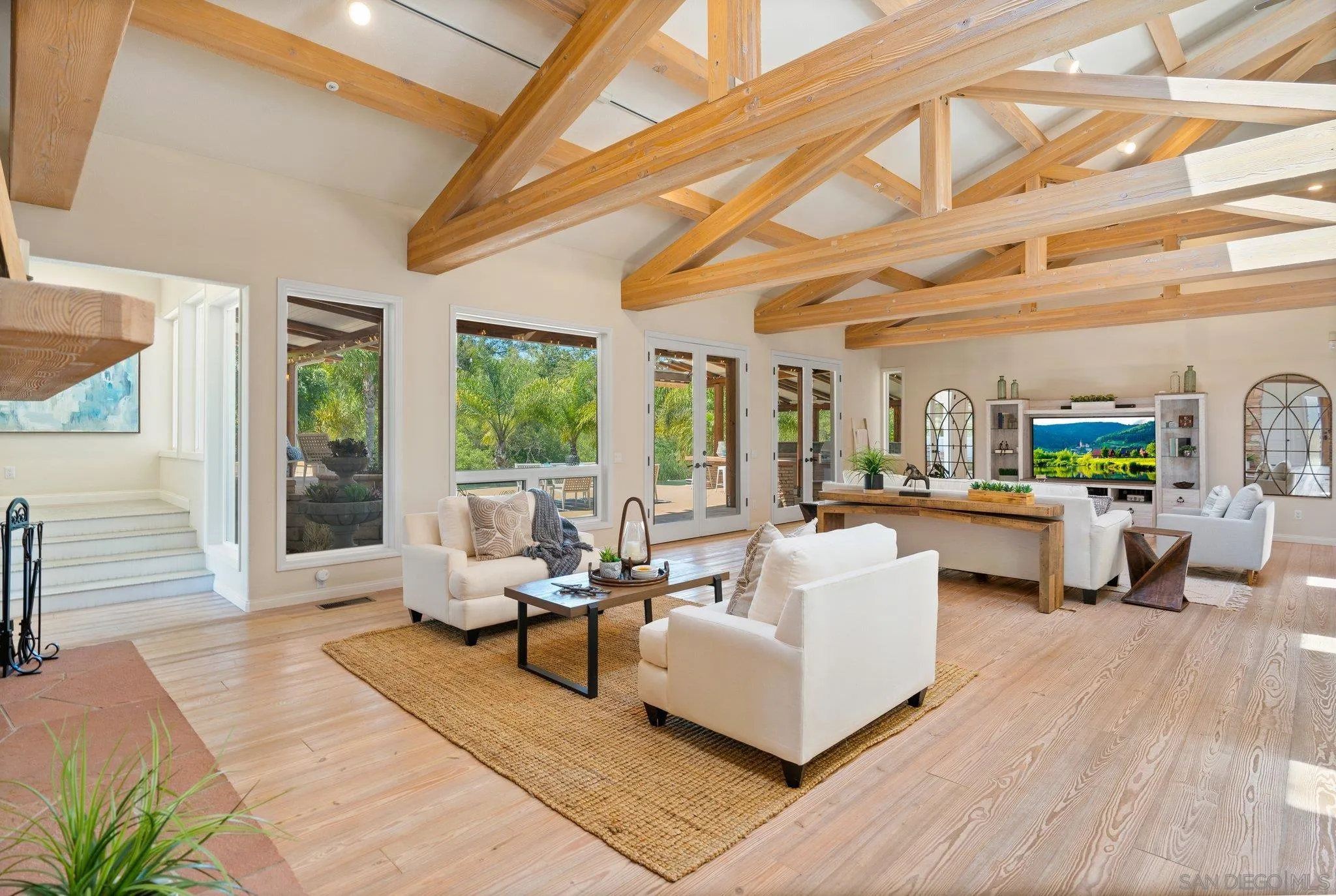 3111 Brookside Lane Encinitas, CA 92024 - Photo 7 of 40 a living room with furniture and a large window