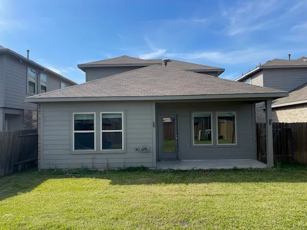 a view of a house with swimming pool