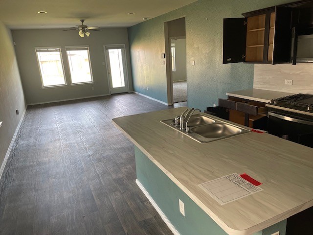 23318 Pelham Prairie Lane Spring, TX 77373 - Photo 2 of 14 a kitchen with a sink and a stove
