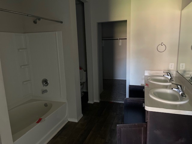 23318 Pelham Prairie Lane Spring, TX 77373 - Photo 6 of 14 a bathroom with a sink toilet and shower
