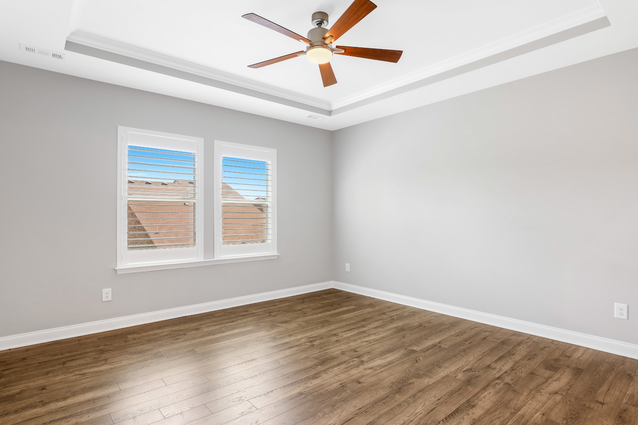 413 Meandering Way White House, TN 37188 - Photo 15 of 24 an empty room with wooden floor ceiling fan and windows