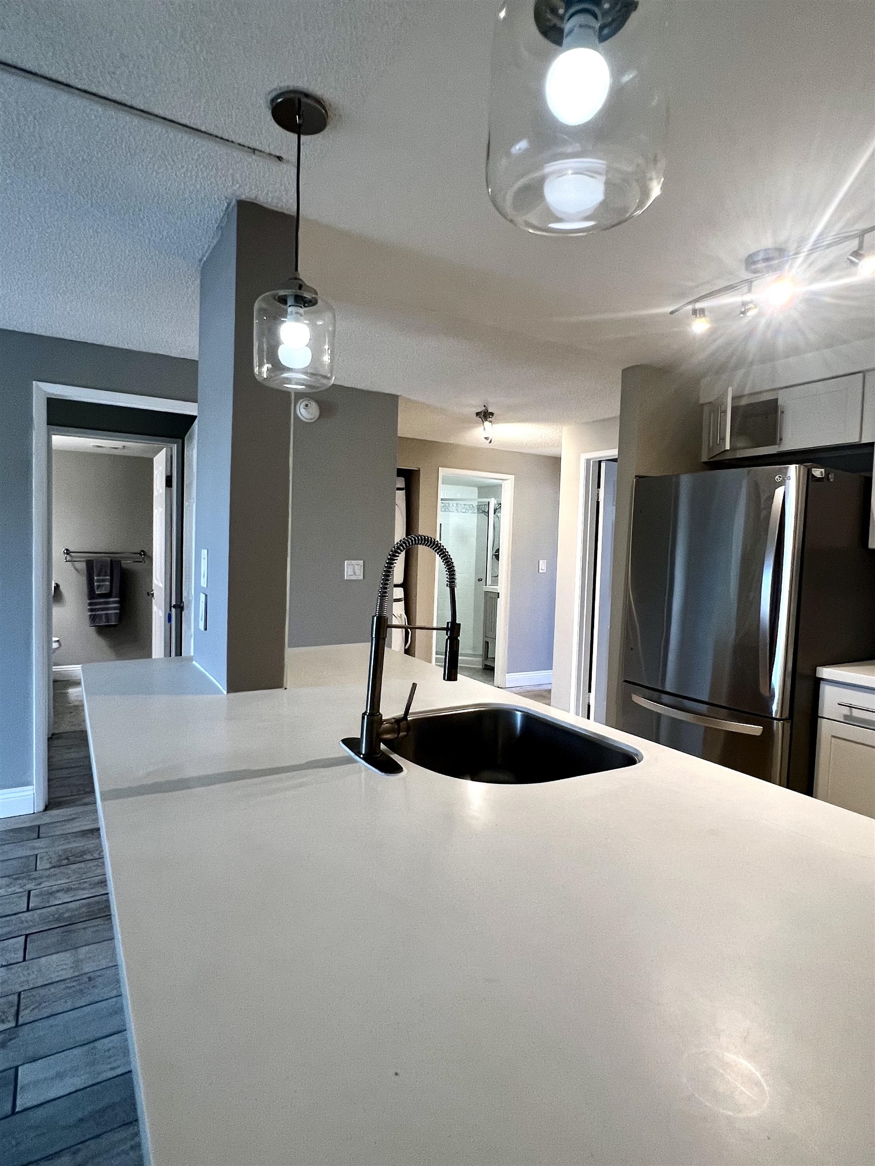 2747 South Kihei Road, Unit B101 Kihei, HI 96753 - Photo 31 of 38 a view of a livingroom with furniture and a chandelier