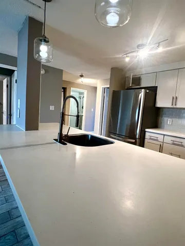 a view of cabinet and mirror